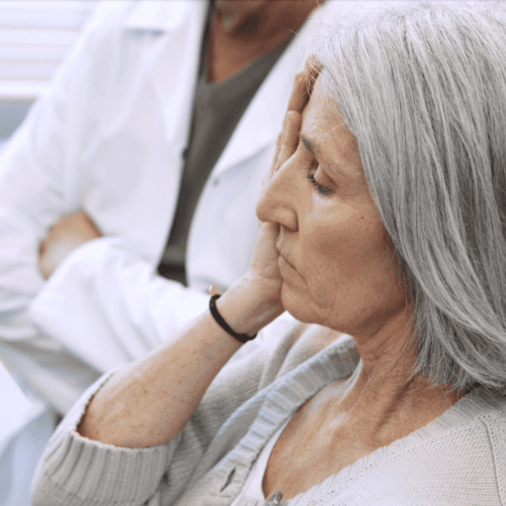 senior woman covering her eye